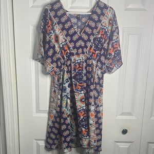 SHEIN CURVE blue and orange floral print bohemian-style v-neck mini dress.